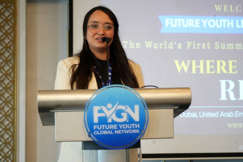 The summit host speaking from the Future Youth Global Network podium in Dubai.