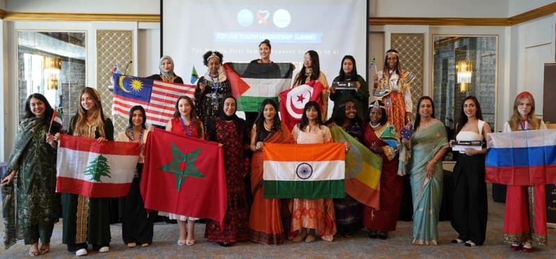 Delegates holding their national flags together at the close of the summit.